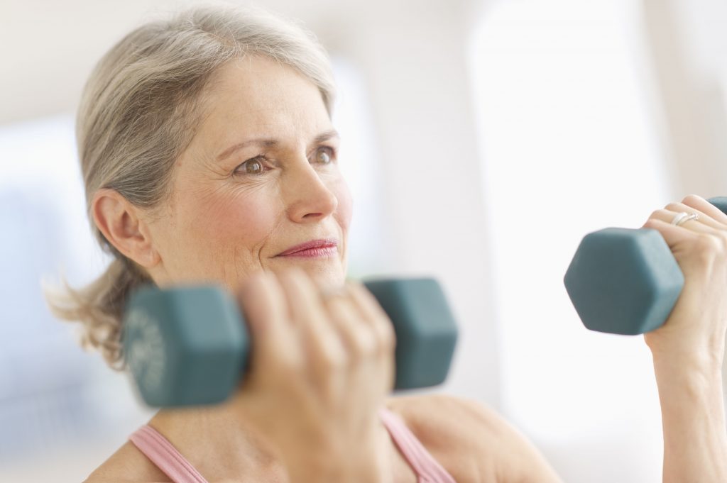 usa-new-jersey-jersey-city-portrait-of-senior-woman-exercising-with-dumbbells-in-gym-144560767-57143f2f5f9b588cc270ba8c